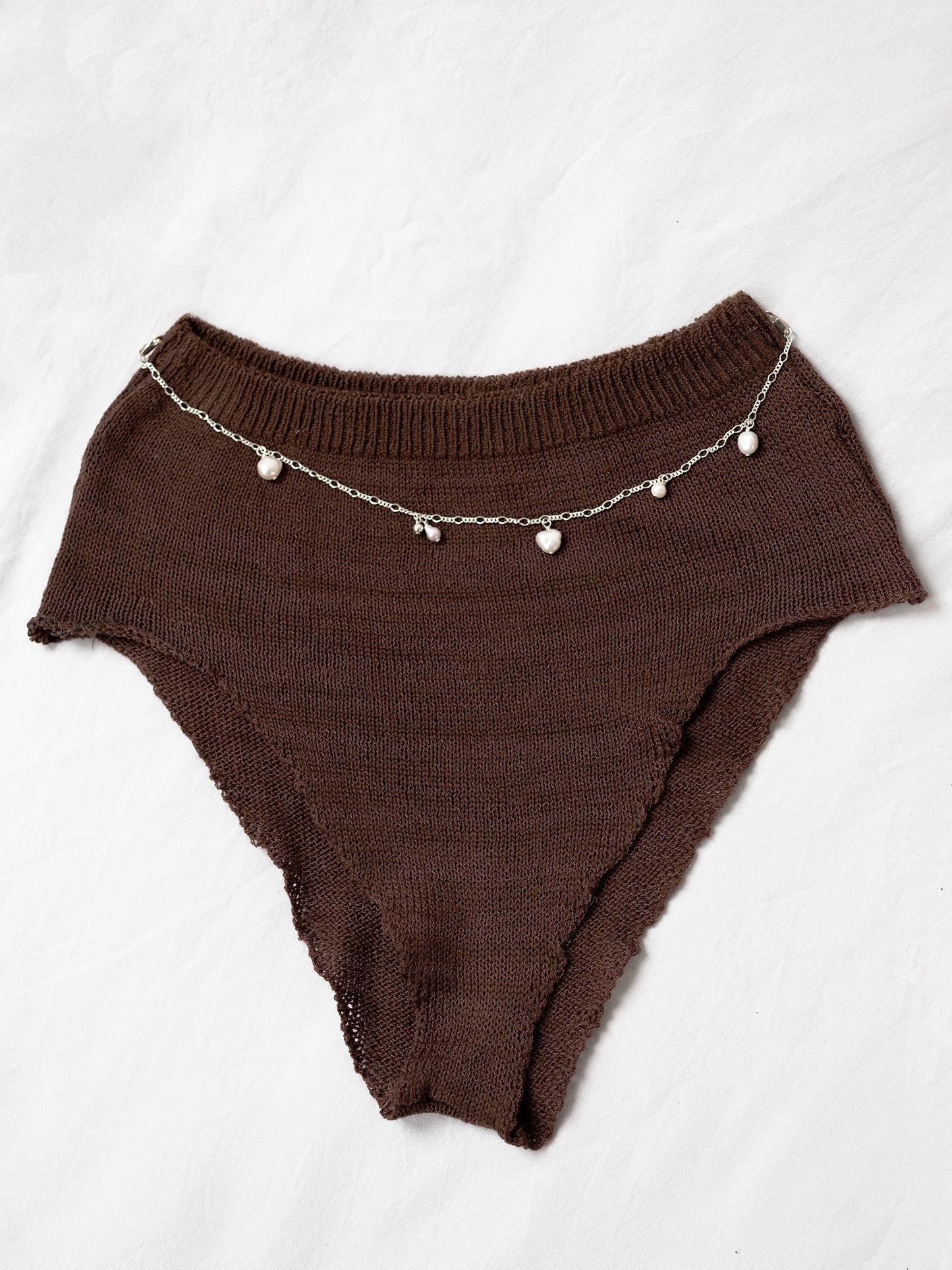 Handknitted culotte with detachable necklace