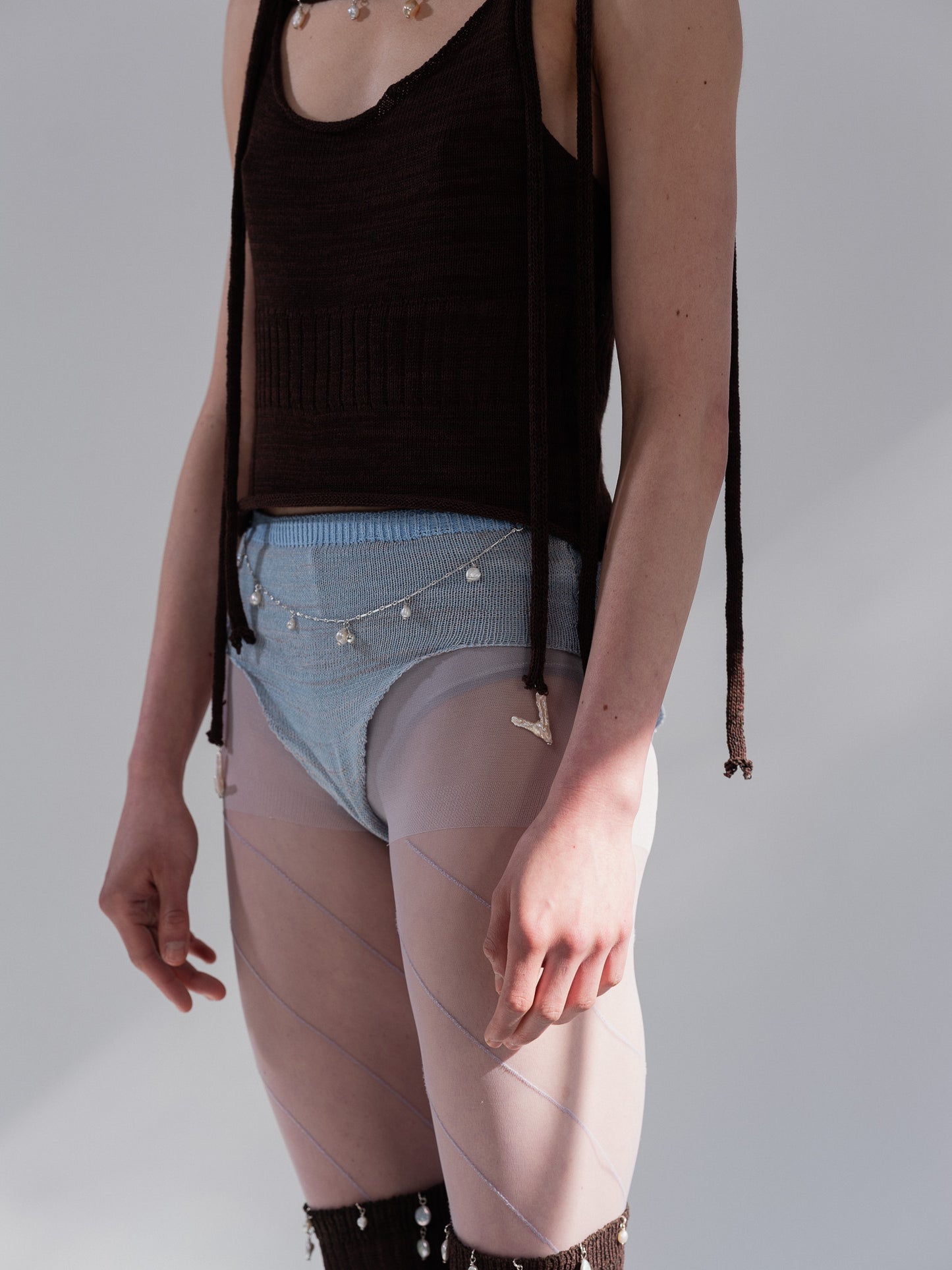 Handknitted culotte with detachable necklace