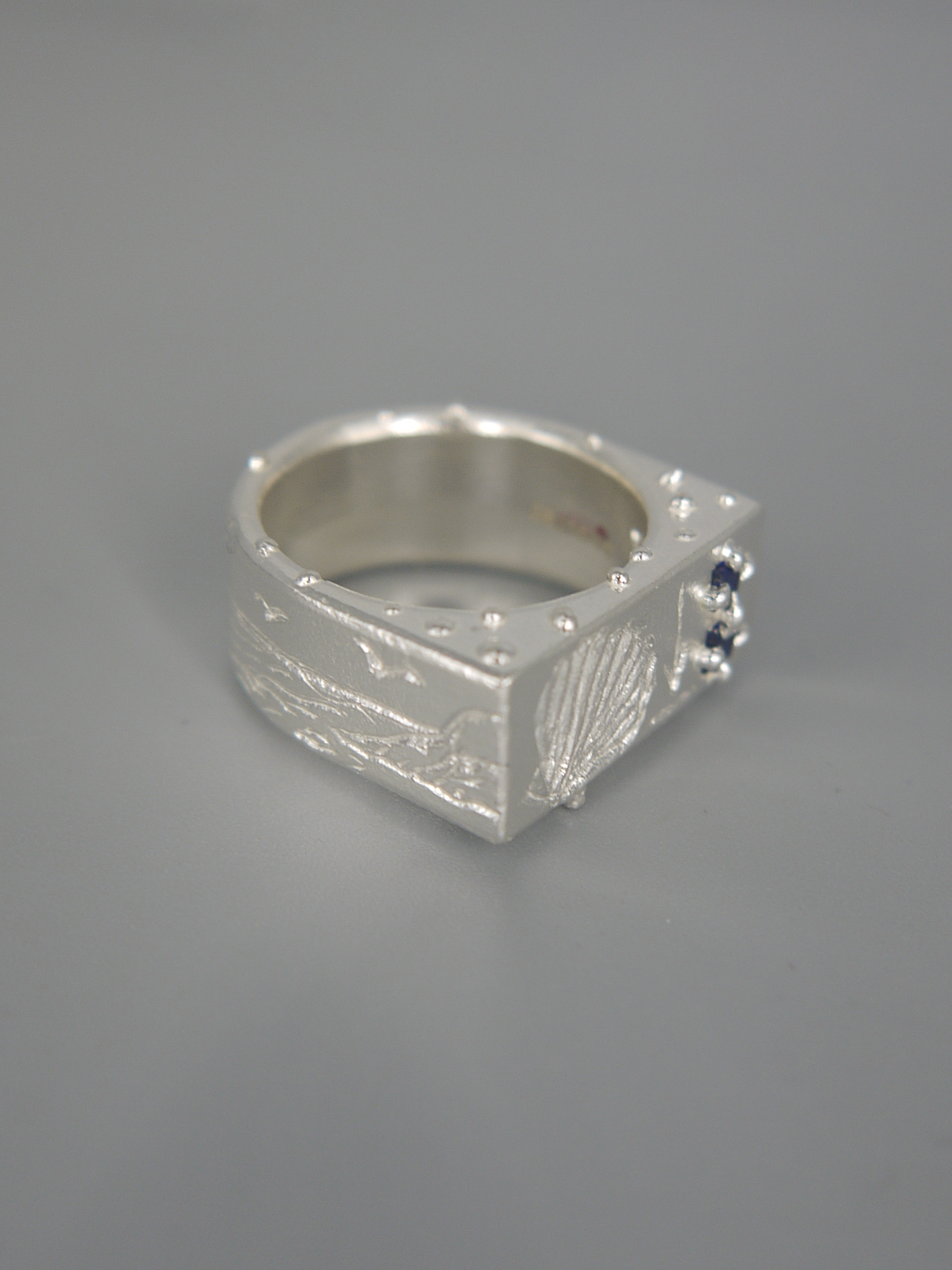 Shell + Two Sapphires Ring