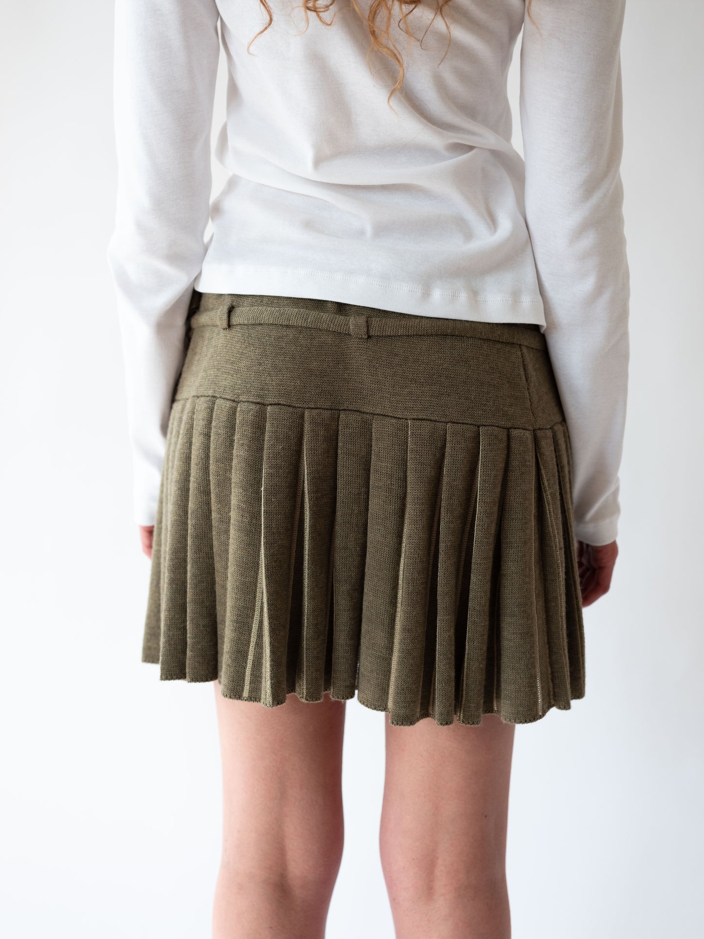 Plica knitted wrap skirt