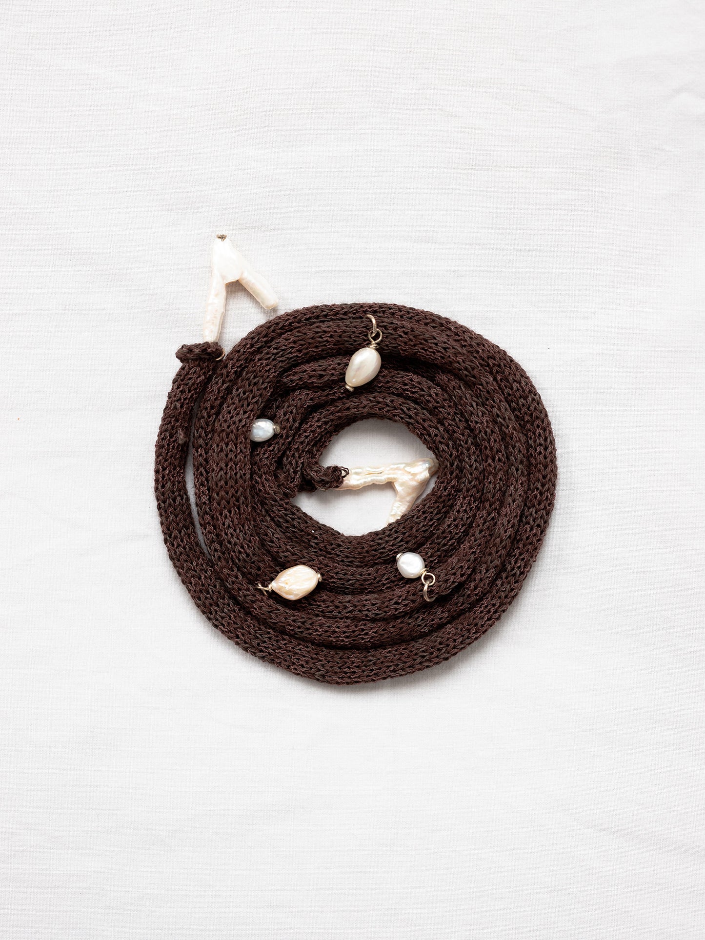 Handknitted top with pearl embelishment