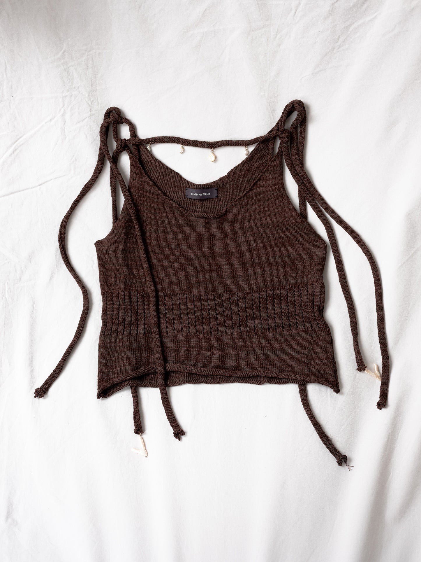 Handknitted top with pearl embelishment