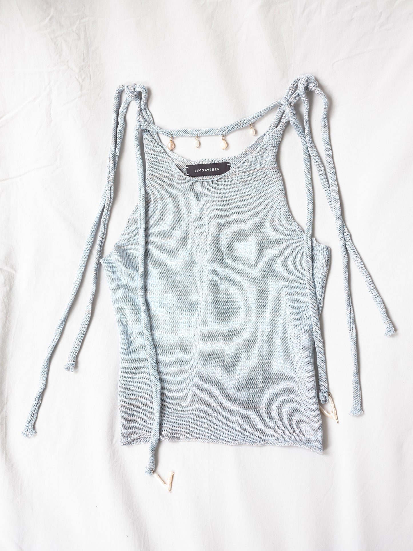 Handknitted top with pearl embelishment